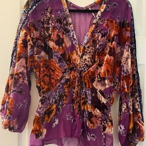 Free People blouse. no tag but never worn. size medium.